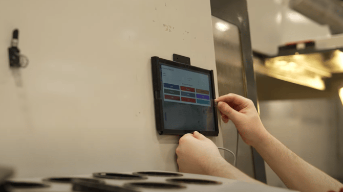 Tablet mounted on CNC machine